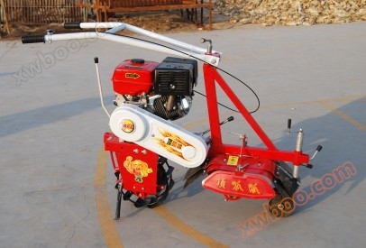 Top notch trenching and soil cultivation machine