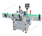 Fully automatic sauce bottle positioning and labeling machine